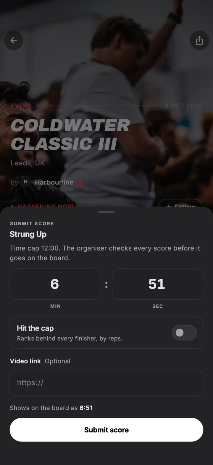 Submitting a time for an event workout, with the cap switch and an optional video link.